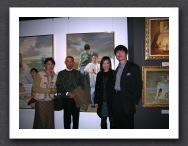 with the model (green T-shirt in the painting) and her parents